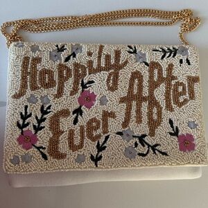 Happily ever after beaded clutch with gold chain.